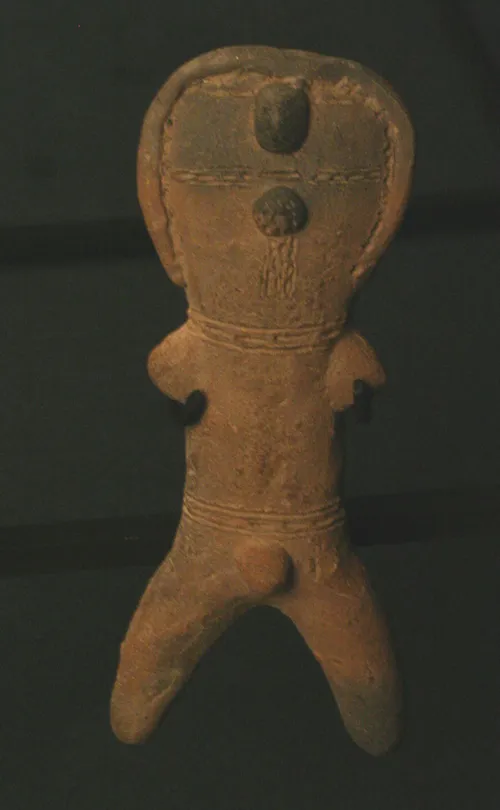 Figurilla antropomorfa masculina