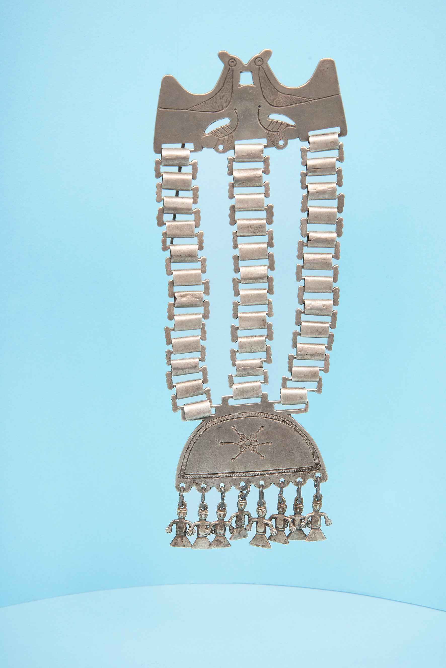 Pectoral. Silver, iron. Trapelakucha; Keltatuwe; Prenteor akucha. Unknown artist | Mapuche, 1900–1950. MCHAP, 2521. Photograph by Justine Graham.